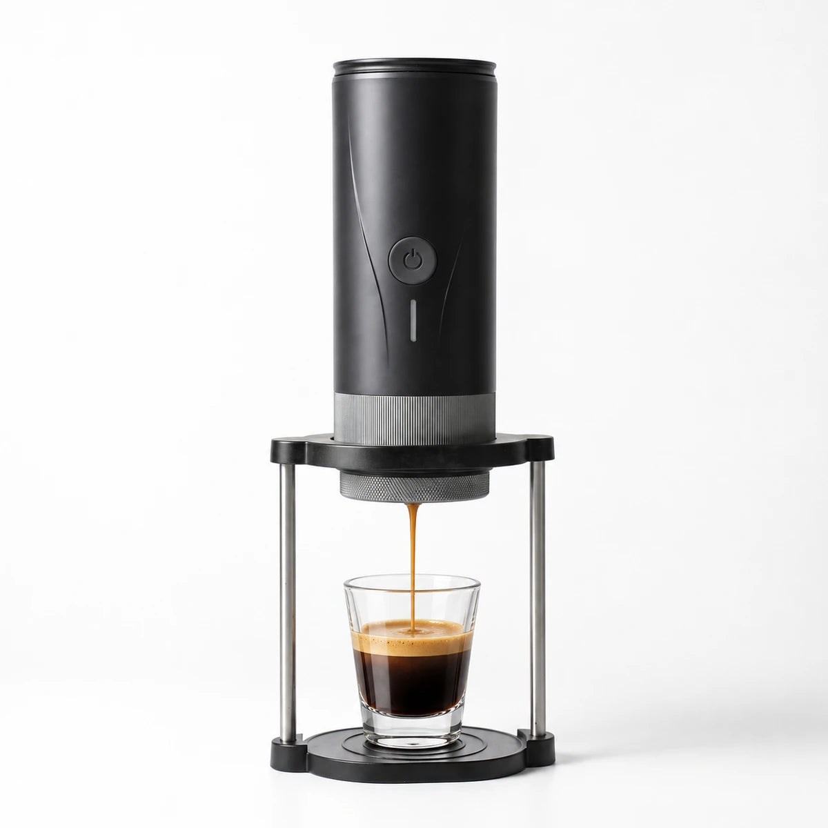 Espressyo Pro brewing into a small espresso glass on its travel stand